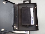 a black box with a video game controller inside of it