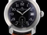 un gros plan d'une montre sur fond noir, avec un bracelet marron