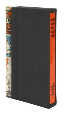 a black book with an orange strip on the cover