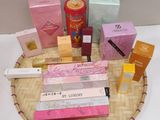 many different types of beauty products on a wicker tray