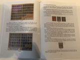 a book open to a page with stamps on it