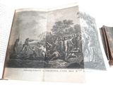 an open book with a picture of a group of people on it