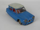 a blue toy car with a white top on a white surface
