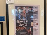 une photo d'une affiche sur le mur d'un bâtiment