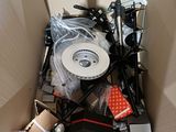 a cardboard box filled with assorted electronics and electronics
