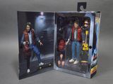 the back to the future action figure is in the box