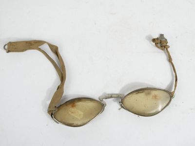 a pair of glasses that are on a white surface