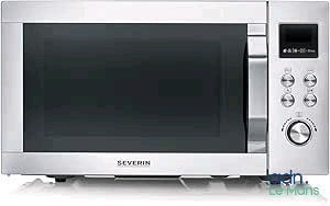 a silver microwave oven sitting on top of a white counter