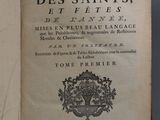an open book with a black and white title on it