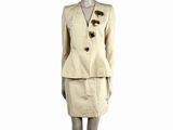 an image of a mannequin dressed in a beige suit and skirt