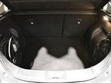 a trunk of a car with a speaker in it