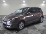 a picture of a brown minivan parked in a room