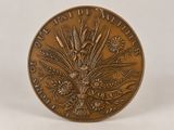 an image of a bronze coin with a bunch of flowers on it
