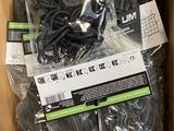 a box with a bunch of black cords inside of it