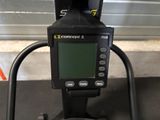 a close up of a digital device on a stand
