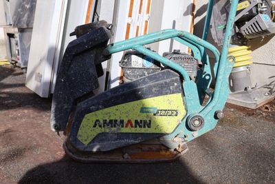 a small machine that is sitting outside of a building