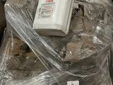 a lot of plastic wrap on a table with a remote control