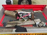 an image of a truck with tools in the back