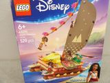 a box of lego disney ' s moan ' s boat on the table