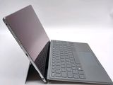 a laptop that has a keyboard on top of it