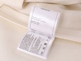 an image of a label on a white shirt