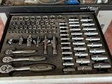 a tool kit in a tool box on the floor