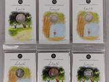 six cartes sur lesquelles sont représentés une balle de golf et des arbres