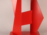sculpture of a red abstract sculpture on a white background