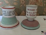 two cups that are sitting on a table