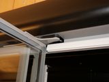a close up of a window that has a handle on it