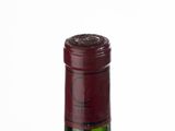 a bottle of wine that is sitting on a table
