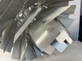 a close up of a metal object on a table