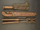 three old tools are sitting on a table next to each other