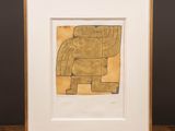 an image of a framed picture of an elephant on a wooden floor