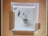 an old photo of a man and a woman in a wedding dress