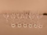 a lot of empty wine glasses sitting on a table