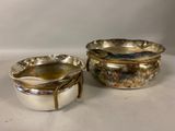 a pair of silverplated bowls with rope handles