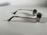 sunglasses on a white surface with a white background