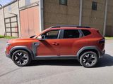 a red suv that is parked in front of a building