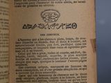 an open book with a drawing of a face on it
