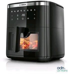an image of a black air fryer sitting on top of a counter