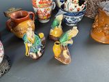many different vases that are sitting on a table