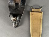 a close up of a metal object with a strap around it