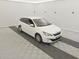 a picture of a white car parked in a garage