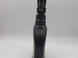 a close up of a black plastic bottle with a black handle