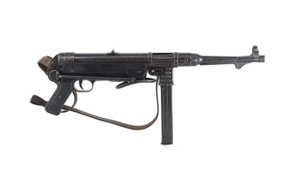 a close up of a machine gun on a white background
