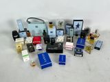 a lot of perfumes that are on the table