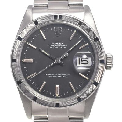 an image of a rolex stainless steel wrist watch with a black dial