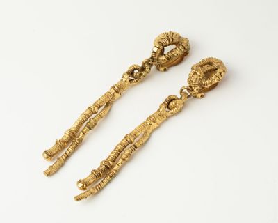 a pair of gold plated earrings