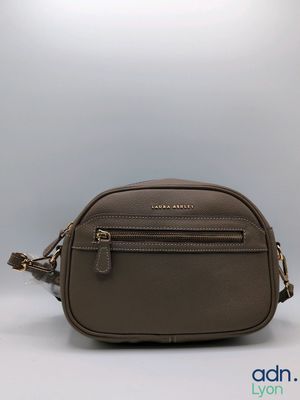 a brown cross body bag with a zipper on the front